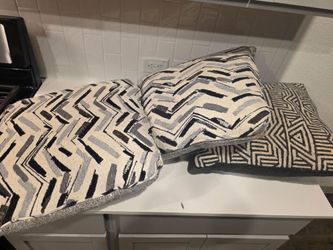 Lightly used couch with throw pillows