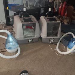 Two puppy whelping incubators SIMPLY THE BEST KENNELS with temperature control & humidifiers.