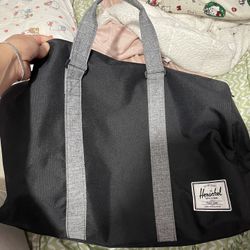 HERSCHEL SUPPLY CO. DUFFLE BAG