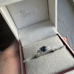 Sapphire petite three stone diamond ring