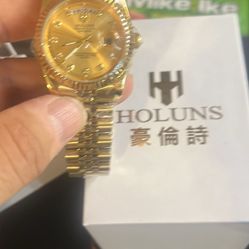 Holuns Day Date Gold Watch