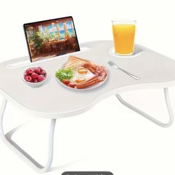 Lap desk features a laptop workstation, bed table for children, writing table, standing office desk, book/tablet holder