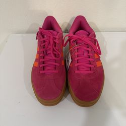 Adidas  pink suede sneakers with orange stripes