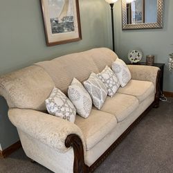 Traditional sofa with wood trim. Excellent condition.