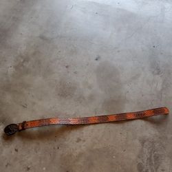 Tooled leather belt and buckle
