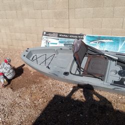 Ascend Boat With Double Sided Paddle,also Comes With Seat That You Can Take Off, Has A Storage Space In Front Of Chair!! THE BOAT IS 12ft T    