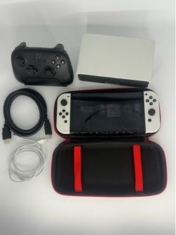 Nintendo switch oled white with 9 games bundle deal