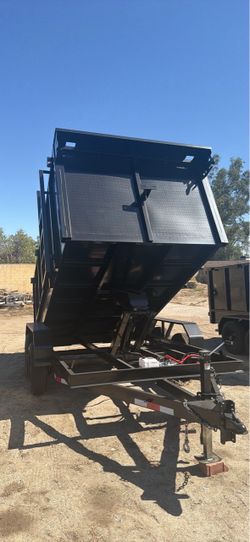 New Sissor hoist dump trailer 12 ft