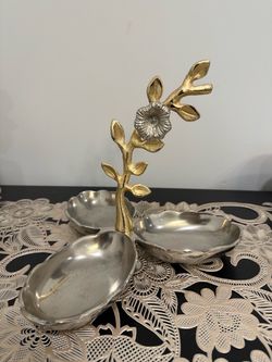 silver and gold serving trays