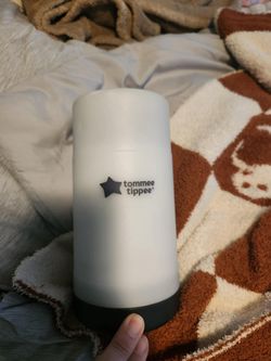 Tomee tipped bottle warmer
