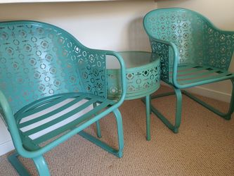 Balcony set, two chairs and one table.