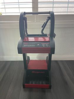 Battery charger snap on