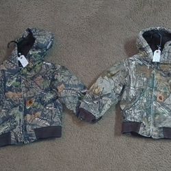 2 Piece Toddler Carhartt Camo Hooded Jackets. NOT $60 FOR BOTH JACKETS. One is a size XXS 4-5 toddler and second is a size XS 6 toddler