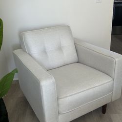 Two Cushioned Accent Chairs 