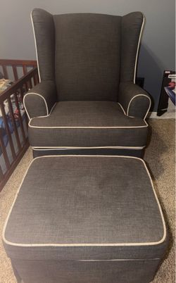 Swivel rocking chair with foot rest