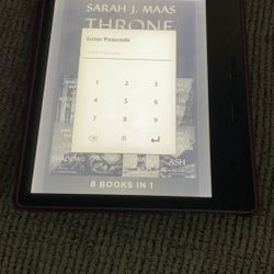 Kindle Oasis with 2 cases and charger 