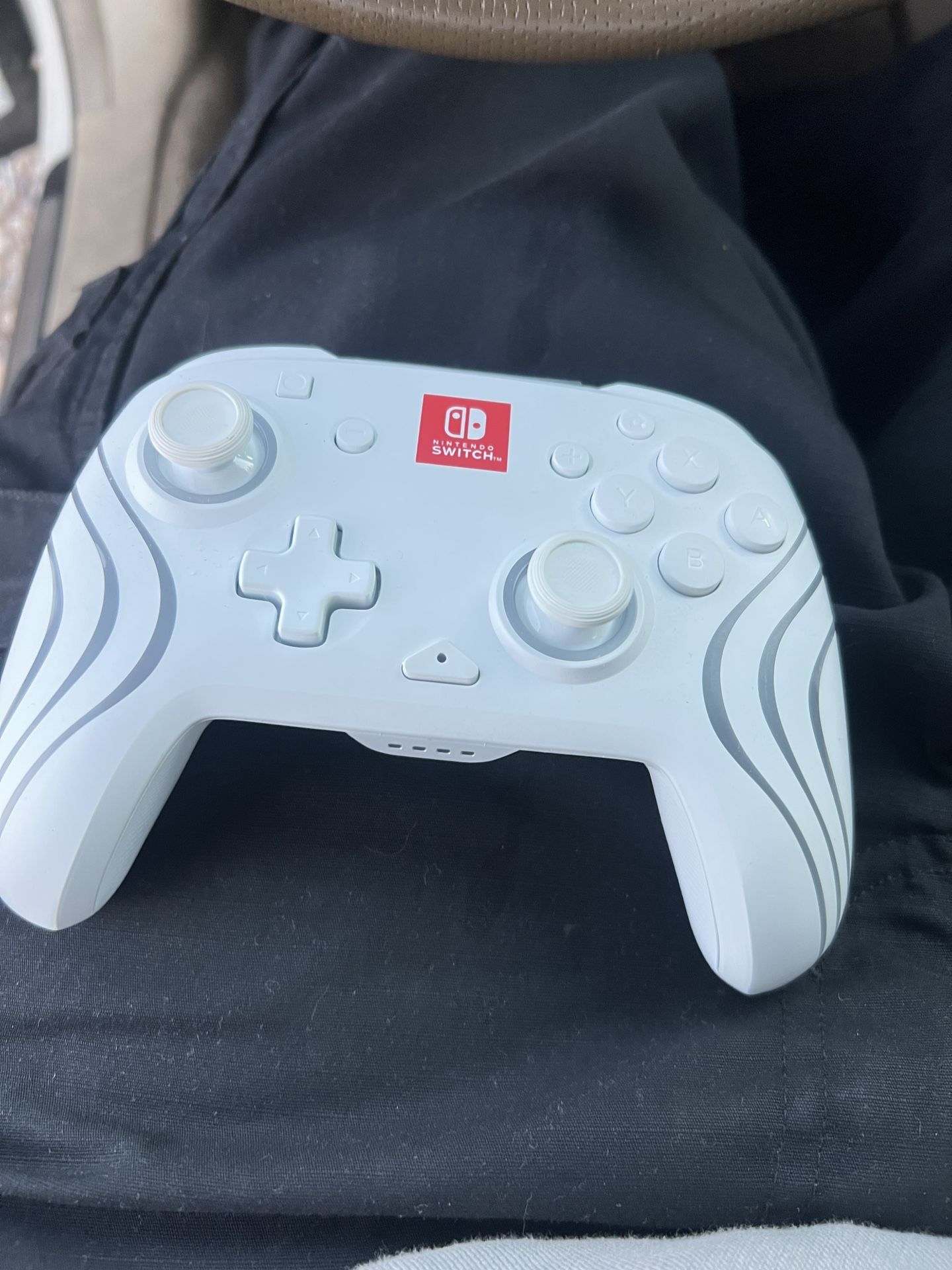 Nintendo Switch With Port, 2 Controllers, 2 Joysticks And The Console Itself