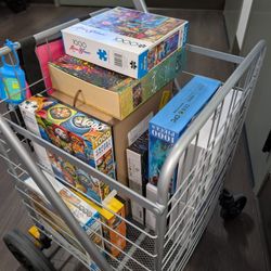 Box of ten 1000 piece puzzles