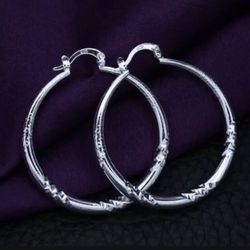 925 Sterling Silver 1.5” classic round diamond cut hoop earrings