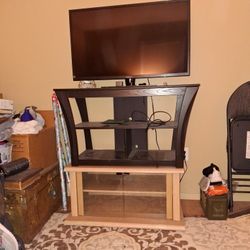 Two TV Stands And TV  Must Go