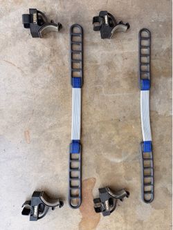 Thule surfboard mount and strap