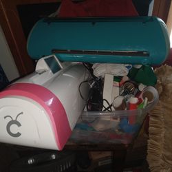 2 Cricut Cutters, Heat Press, & Startup Materials 