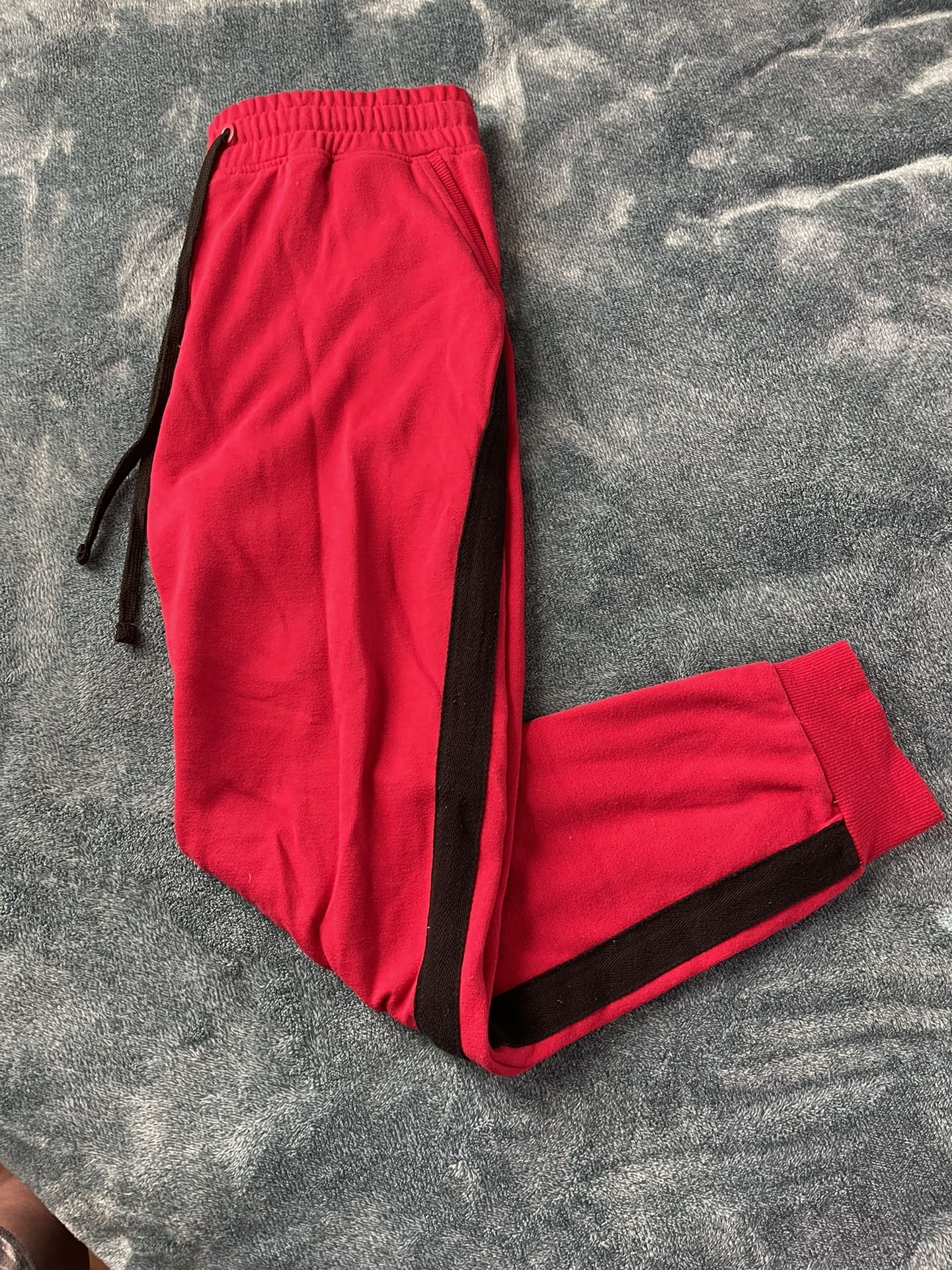 red and black joggers