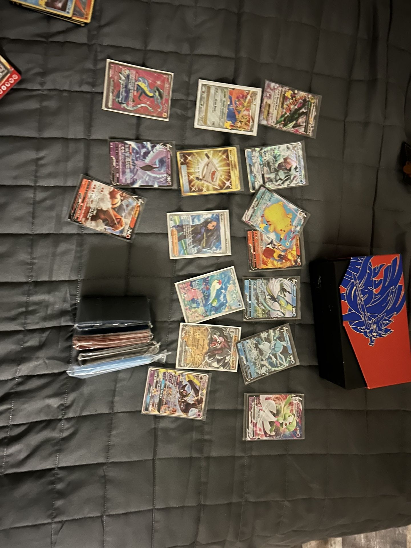 Pokemon card and sleeve lot