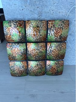 Handcrafted mixed-media wall décor