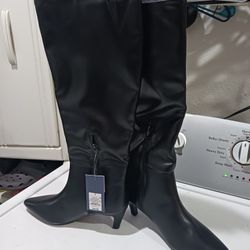 woman boots .  New.  size 9.  