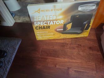 Portable stadium seat with heater