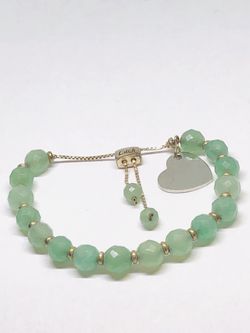 Silver tone slider bracelet with faceted disc ball aventurine on a chain