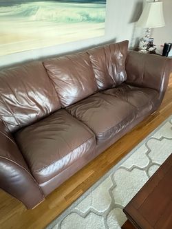 Dark brown leather sofa couch
