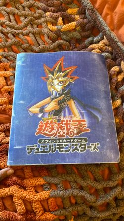 Yu-Gi-Oh card binder (filled with cards)