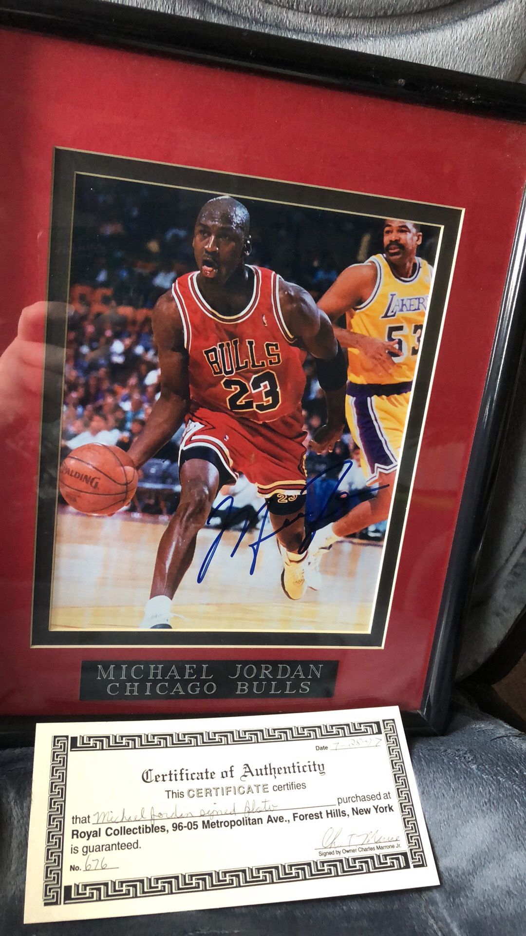 Autographed Michael Jordan color photo framed and matted with coa