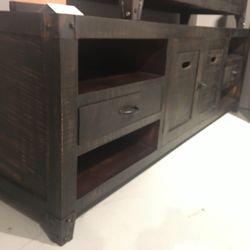 New 77” wide, Entertainment center , showroom floor model
