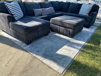 3 Piece Sectional with Ottoman Storage and Cup holders from Ashley HomeStore