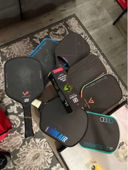Set of pickle ball paddles!