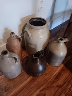 Antique primitive stoneware pottery jugs and crocks