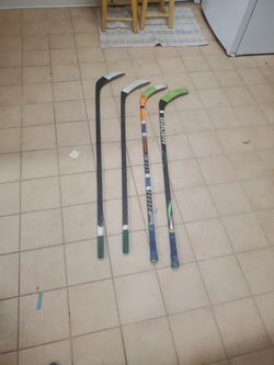 Pack Of 4 Hockey Sticks