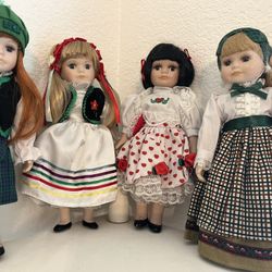 Selling a set of Royalton Collection porcelain dolls, each dressed in beautiful traditional outfits. They’ve been gently displayed and well cared for.