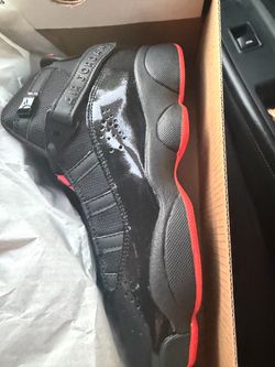 Air Jordan 11 Bred Black Red Sneakers