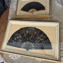 Unique framed French fans.