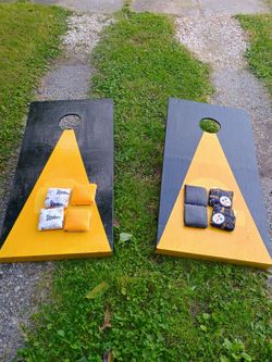 Two - 2' by 4' Pittsburgh Steelers Cornhole boards & 8 ACA Regulation Corn Hole Bags