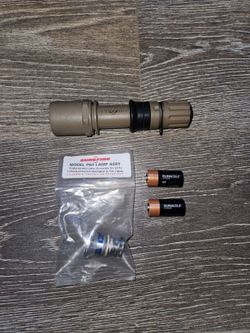 Surefire Light with extra P60 Lamp Assy. Batteries Included.