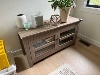 Mid sized 44” entertainment center/ cabinet storage