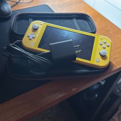 Nintendo Switch Lite + Charger & Case