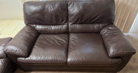 Natuzzi Loveseat $299 + matching sofa free”