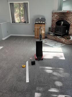 Installation of carpet.