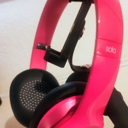 Beats by Dr. Dre Solo 2 wired on-ear headphones in a pink color. 